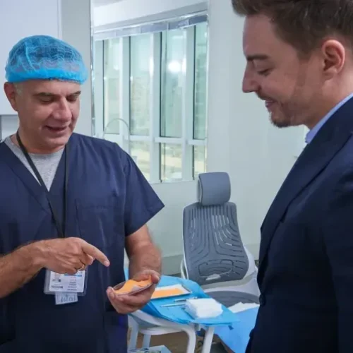 Dr. Ziakas consulting a hair transplant patient at Alborj Hair Clinic, Dubai